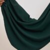 Abaya en soie de Médine vert sapin, manches bouffantes et coupe ample