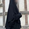 Tunique ample à poches noir, vue de profil, manches élastiques